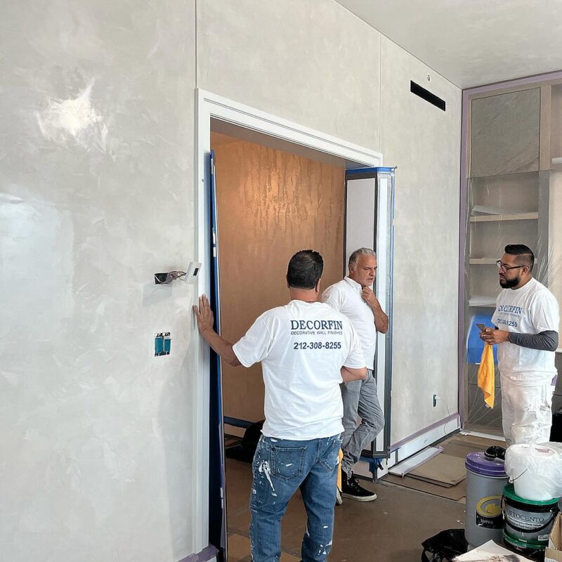 Decorfin team members expertly install venetian plaster